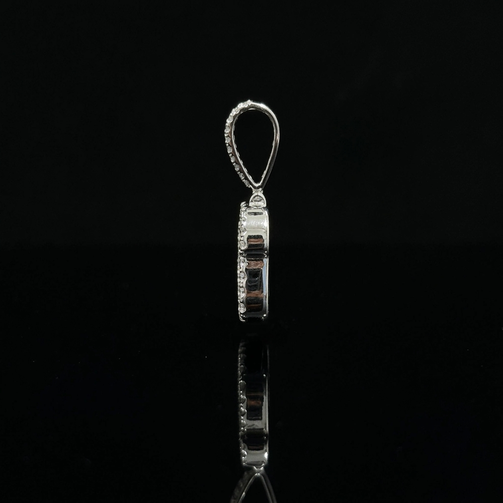 Pendant side profile on reflective black glass