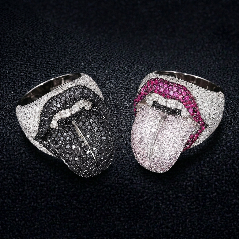 Tongue-and-lips rings on dark fabric background